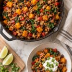High-protein turkey and butternut squash skillet with black beans and spinach, served with Greek yogurt and cilantro